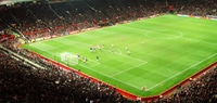 Football match with Manchester United team at Old Trafford stadium